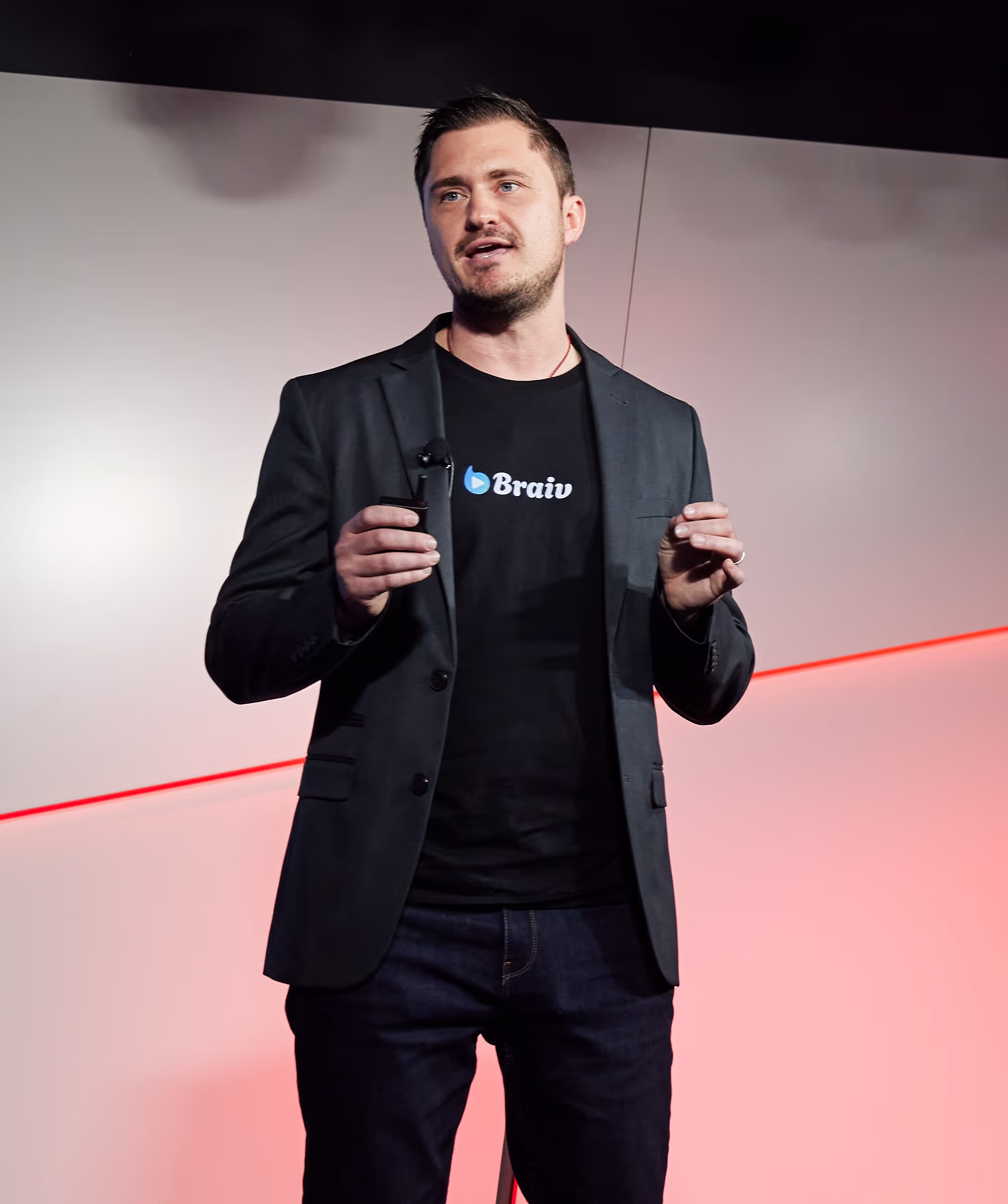 Photo of the CEO speaking on stage